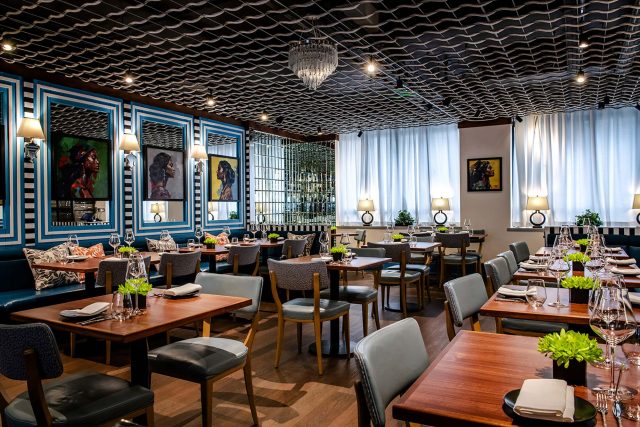 The elegant interior and table settings of Kanishka fine dining restaurant in Mayfair.